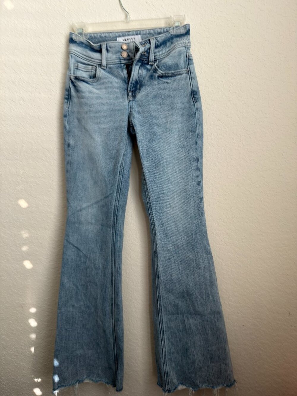 Vervet Bella Size 23 Mid Rise Flare Jeans Light Wash Raw Hem. (A)